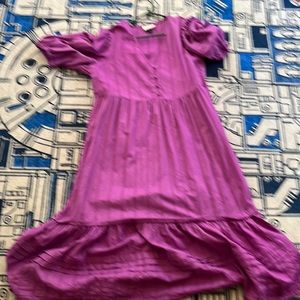 Worn gently. Purple fun.